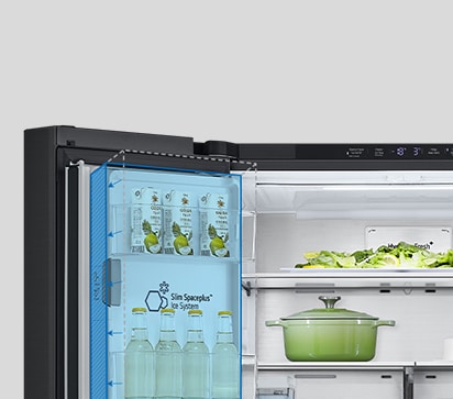 Inside the refrigerator, a slim indoor ice maker is highlighted in blue and the refrigerator is full of ingredients