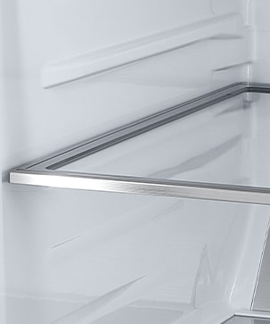 A diagonal view of the shelf with metallic paneling on the interior of the refrigerator.