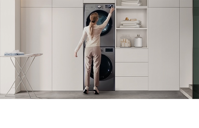 The video contains several comparison scenes. Stackable washer and dryer, each with a control panel, shows the inconvenience of an adult woman sticking out her heel to operate the panel. Meanwhile, the LG Objet Washtower™ shows that the washing machine and dryer can be centrally controlled as a single unit, so even a young boy can easily access it.