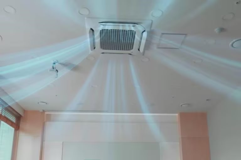 The ceiling-mounted LG Dual Vane Cassette unit delivers airflow into the room through each of its vanes.