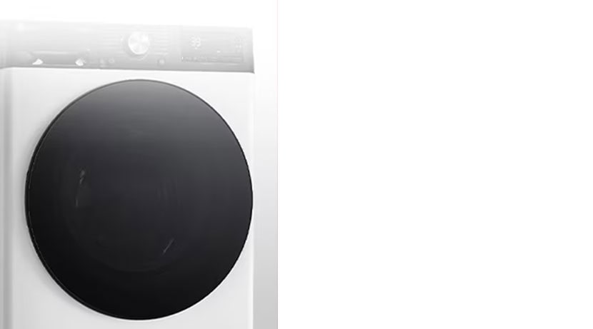 Wyraźnie widoczny obraz pralki z drzwiami ze szkła hartowanego.