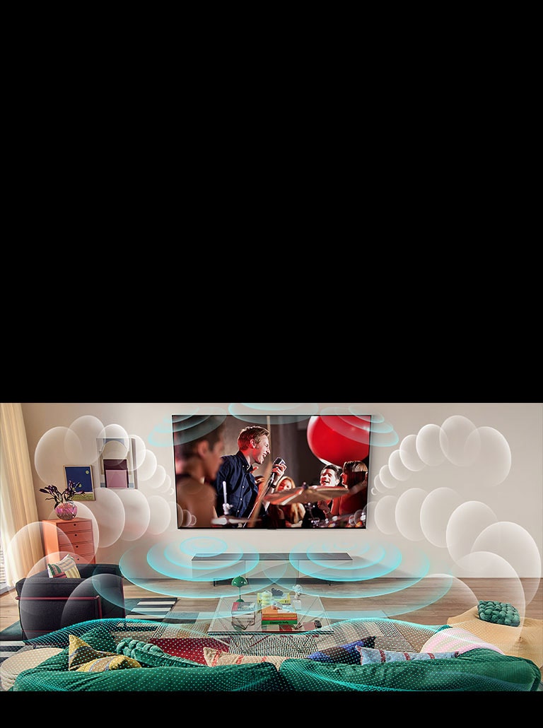 Obraz telewizora LG OLED TV w pokoju z koncertem na ekranie. Przestrzeń wypełniają bąbelki symbolizujące wirtualny dźwięk przestrzenny.