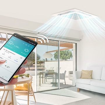 Uma imagem de alguém a operar um ar condicionado no teto, com um smartphone.