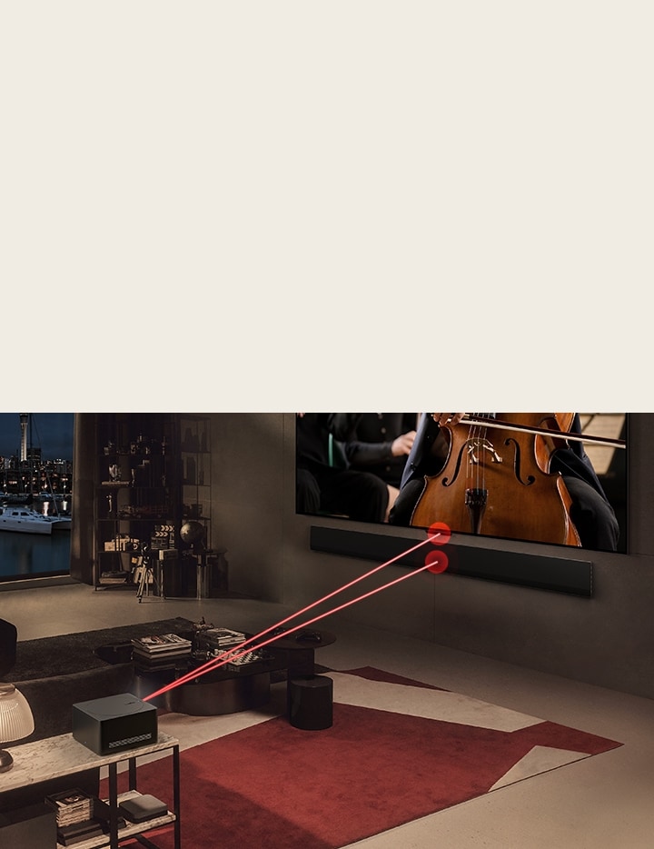 Um concerto é reproduzido no ecrã do LG OLED evo M4 e uma Zero Connect Box está à frente. Aparece um sinal Wi-Fi vermelho por cima da Zero Connect Box e dois feixes de luz vermelha são emitidos em direção à TV e à LG Soundbar.