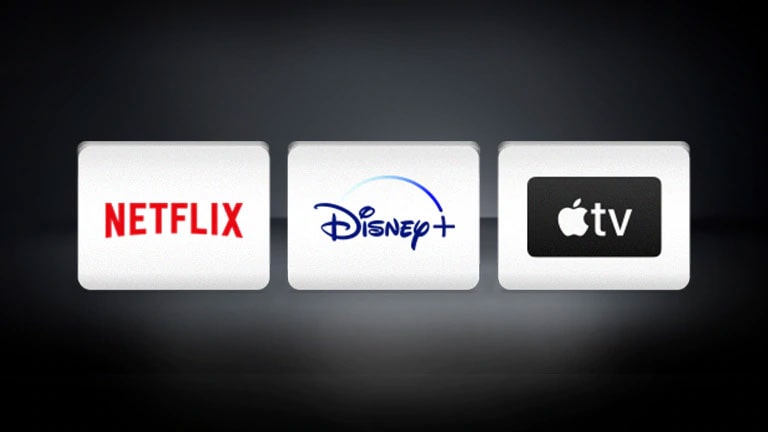 O logótipo Netflix, o logótipo Disney , o logótipo Apple TV organizados horizontalmente num fundo negro.