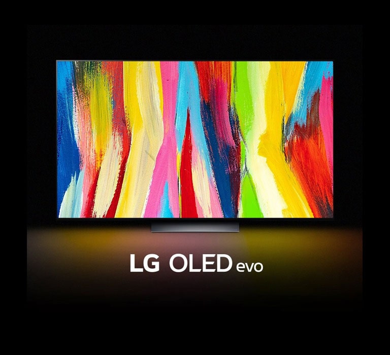 تلفزيون OLED C2 من LG في غرفة مظلمة مع عمل فني تجريدي ملون لخطوط عمودية على شاشته ومكتوب تحتها عبارة "LG OLED evo".