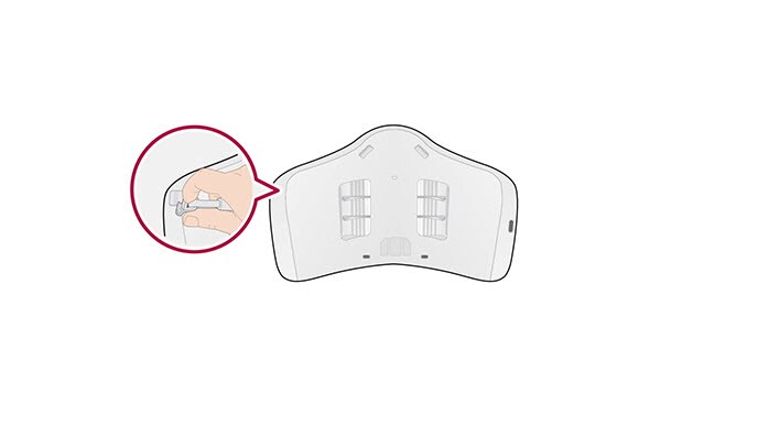 A video shows the interior of the PuriCare Wearable Air Purifier with the ear straps extended out and then they fold in on the interior. A circle appears magnifying where the ear straps are connected to the mask and a hand moves down to open along with an arrow showing the direction to remove the straps. Next, new straps are inserted and the hand moves up to insert them. The video ends showing the interior of the mask with the ear straps once more.