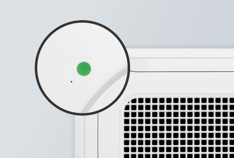 A human detecting sensor places the corner of the LG ceiling mounted cassette and the green light of the sensor is on.