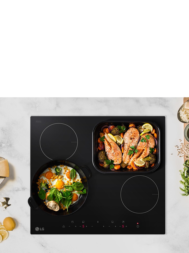 The cooktop is seen from above. Two burners have pans of food on top.