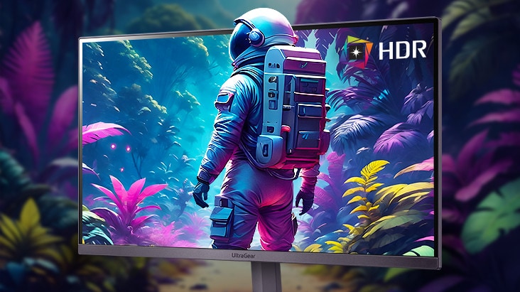 An image of an astronaut on a monitor with three-dimensional, dynamic colors.