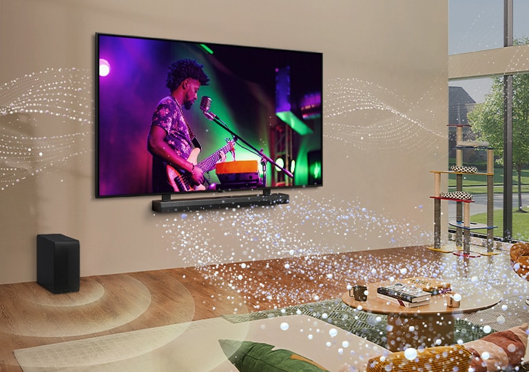LG TV and LG soundbar mounted on the wall in a living room and bright shape graphics all around the room.