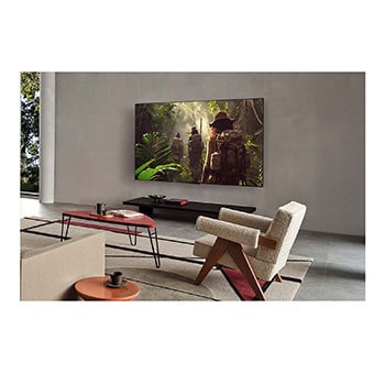 LG AI Magic Remote med AI-knappen markerad. Runt den visas de olika funktionerna som en användare kan komma åt från knappen. AI Voice ID, AI Search, AI Chatbot, AI Concierge, AI Picture Wizard, AI Sound Wizard. Texten förklarar att LG AI Magic Remote kompletterar din AI-upplevelse med en dedikerad AI-knapp och kan användas som en virtuell mus. Peka och klicka.