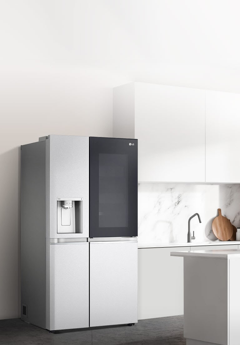 A side view of a kitchen with a black InstaView refrigerator installed.