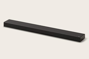 En svart Sound Suite H7 Soundbar sedd uppifrån, vriden i en lätt vinkel