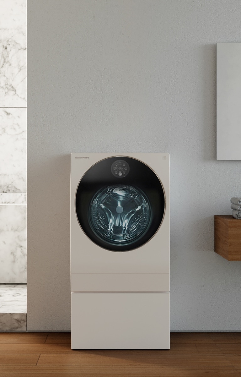LG SIGNATURE Tvättmaskin placeras i det moderna lyxiga tvättstugan.