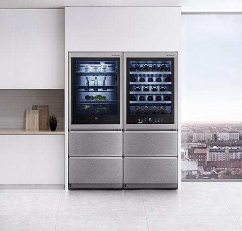 LG SIGNATURE Refrigerator and Wine Cellar are laid on one side of the minimal style kitchen, with a city backdrop.