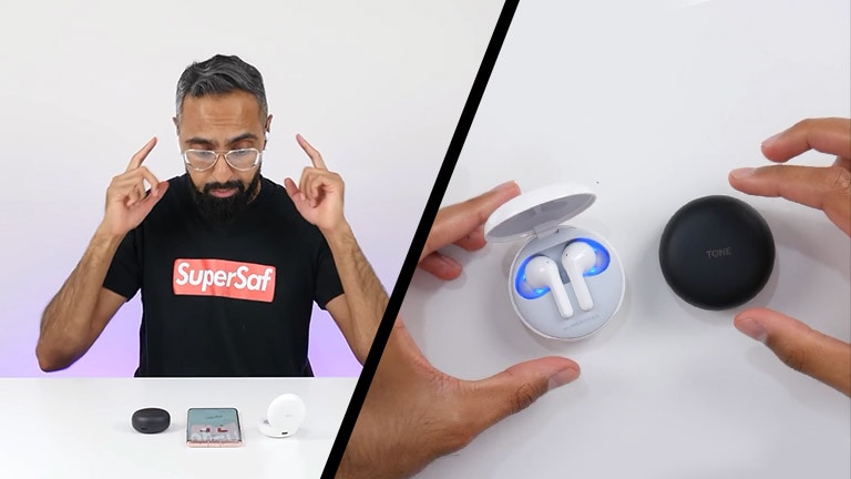 A tech reviewer wearing and holding the earbuds