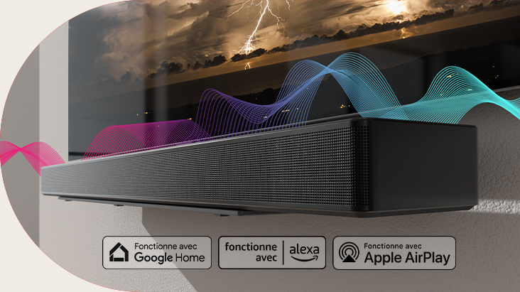 The soundbar is hung on the wall with the TV right above. Sound waves are crossing between them changing their colors from red to blue.