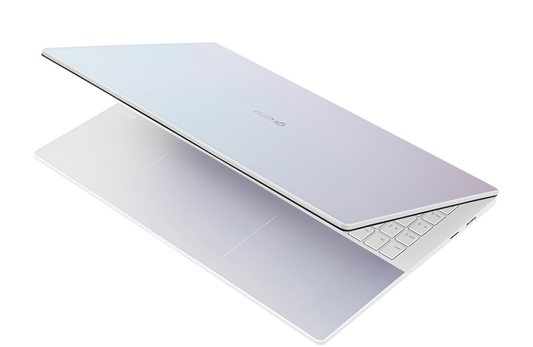 -30 degree side view and half-open LG gram Style Laptop.