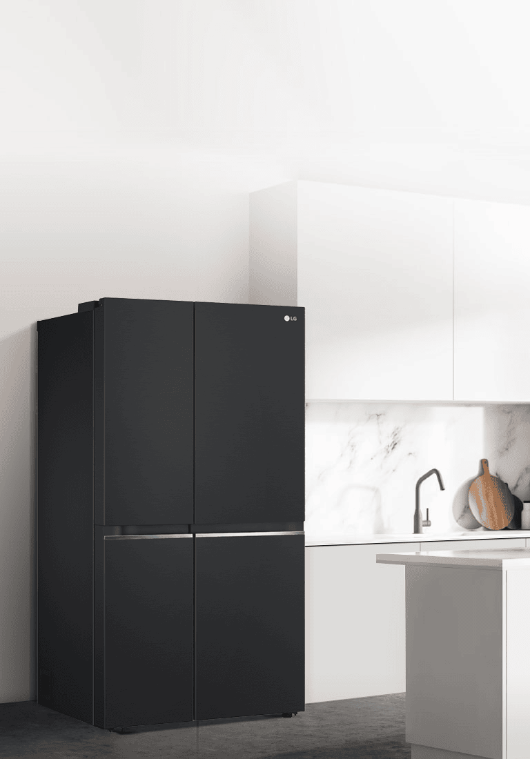 A side view of a kitchen with a black InstaView refrigerator installed.