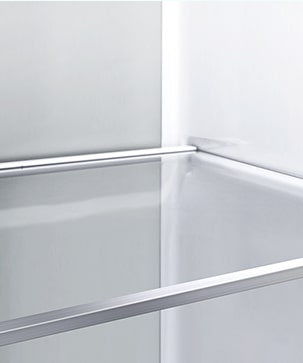 A diagonal view of the shelf with metallic paneling on the interior of the refrigerator.