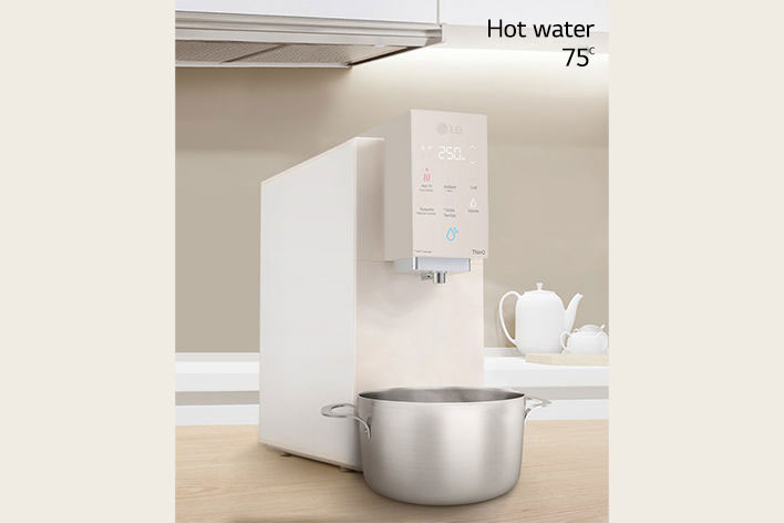 Image of hot water in a pot with a water purifier	