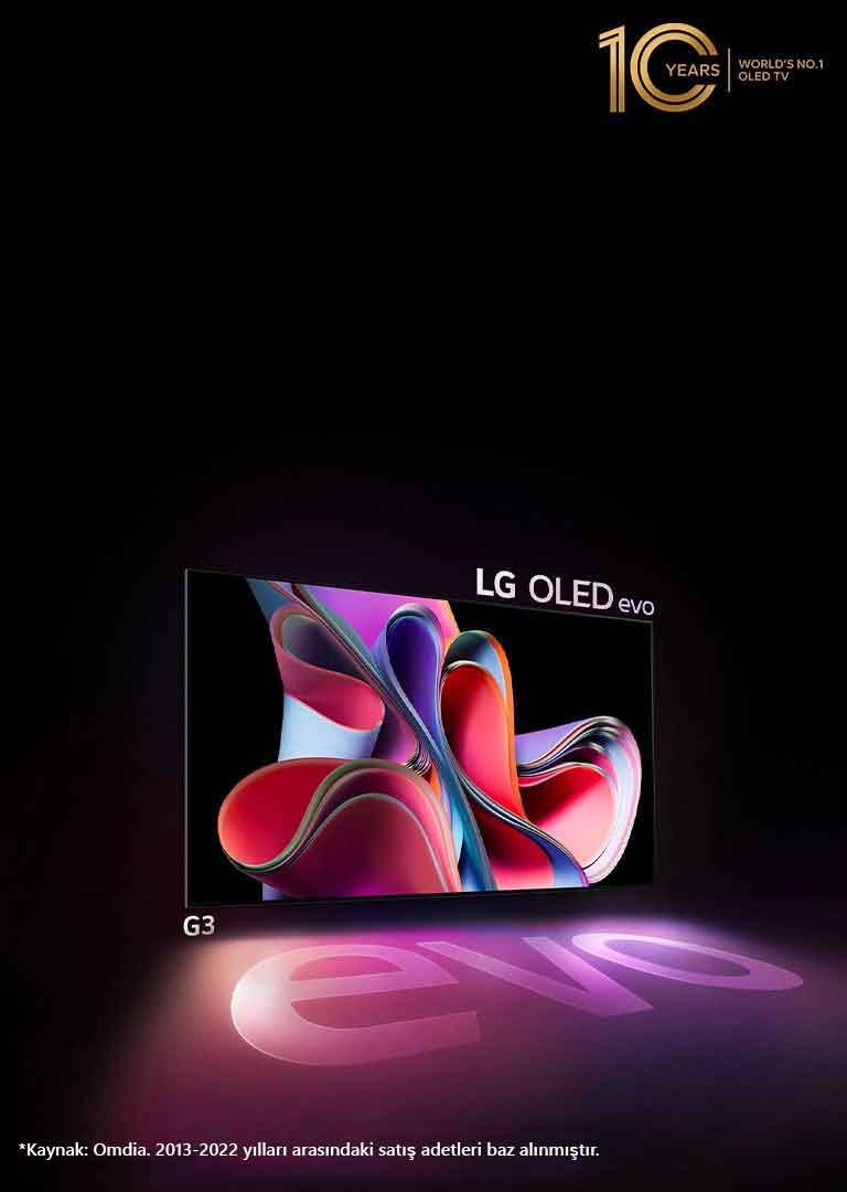 Siyah zemin üzerinde parlak pembe ve mor bir soyut çizimi gösteren LG OLED G3 görüntüsü. Ekran, "evo" kelimesini içeren renkli bir gölge oluşturur. "10 Yıldır Dünyanın 1 Numaralı OLED TV'si" amblemi, görüntünün sol üst köşesindedir.