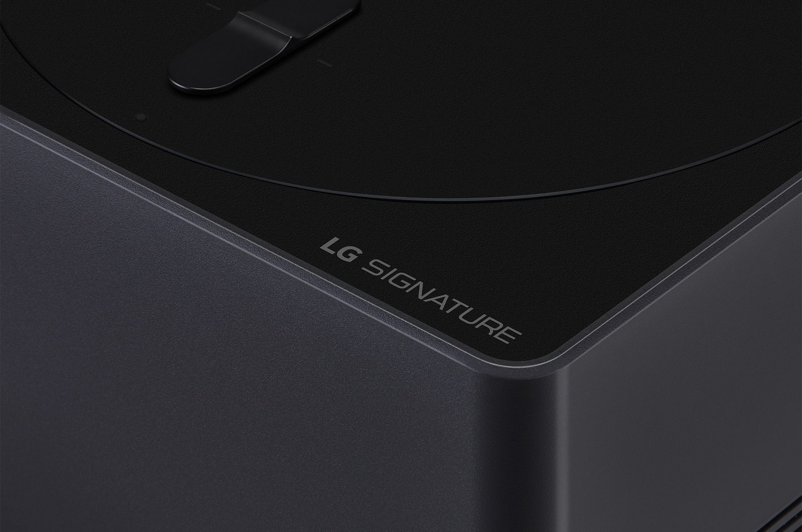 Close-up image of a Zero Connect Box showing the logo of LG SIGNATURE on the edge