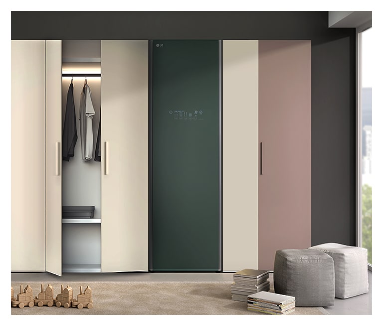 It shows LG Styler Objet Collection stood with built-in closet in dressing room.