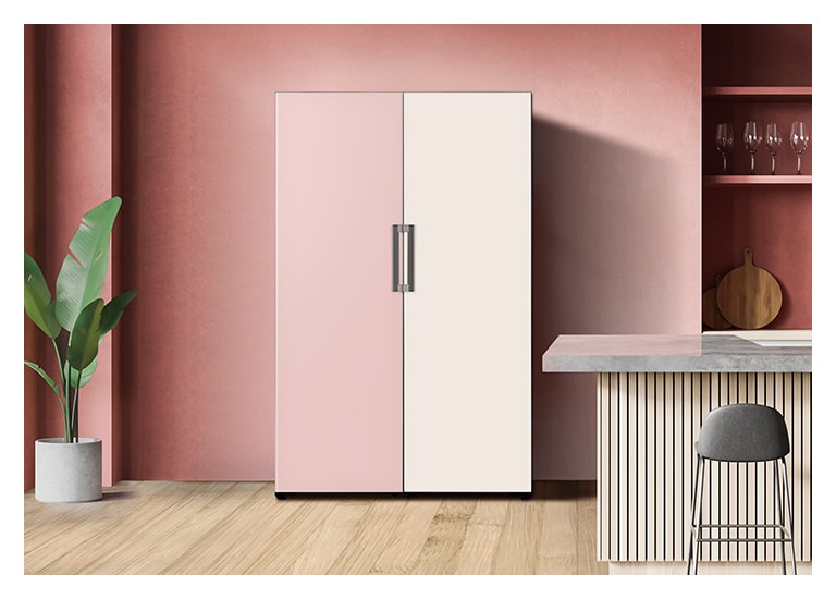 It shows mist pink and mist beige color Freezer placed in the kitchen.