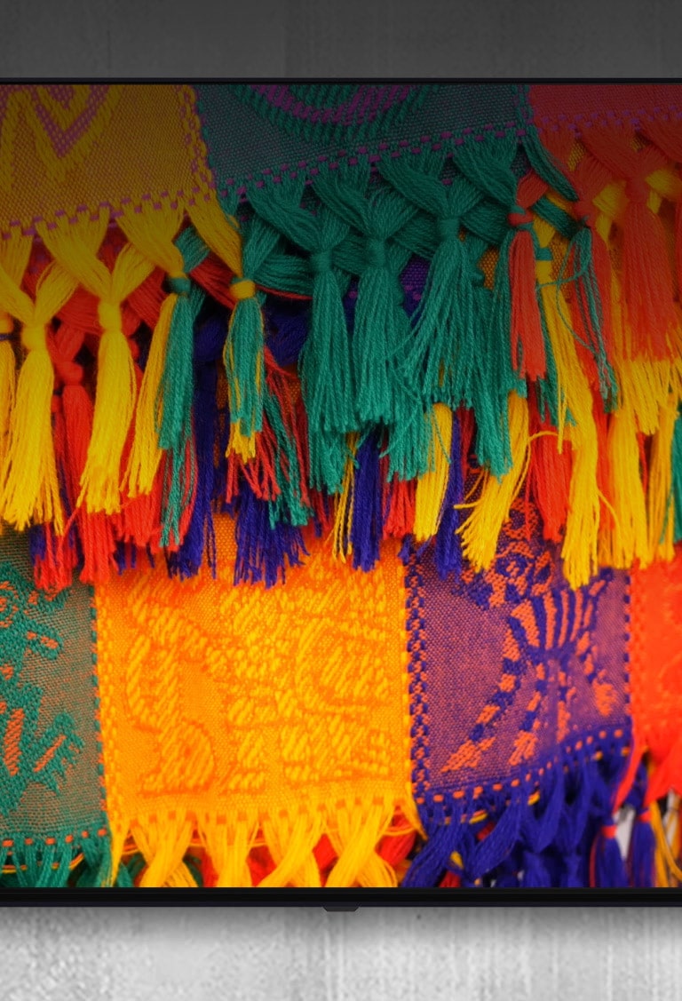 按下遙控器上的按鈕時,電視執行說出的指令,例如「調高音量」。