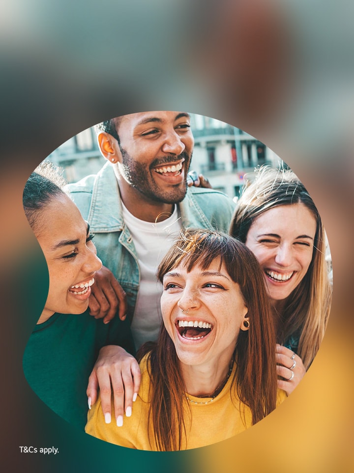 a group of young people smiling together