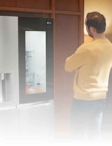 A man stares at his InstaView fridge freezer