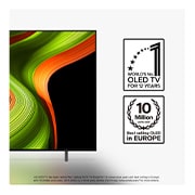 Colorful parrot in ultra-high definition against a black background. Water drops are suspended in the air all around it. The image showcases Perfect Color as each different hue on the parrot's body is vibrant and vivid. The dark background with the detailed water splashes also highlights how the screen is reflection-free. Different logo certifications from UL and Intertek are visible. These refer