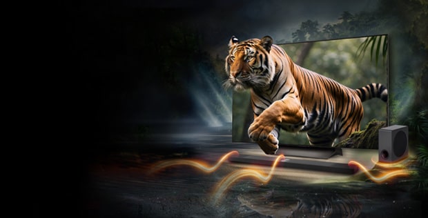 a vivid picture of a tiger jumping out of an lg oled tv with a soundbar underneath