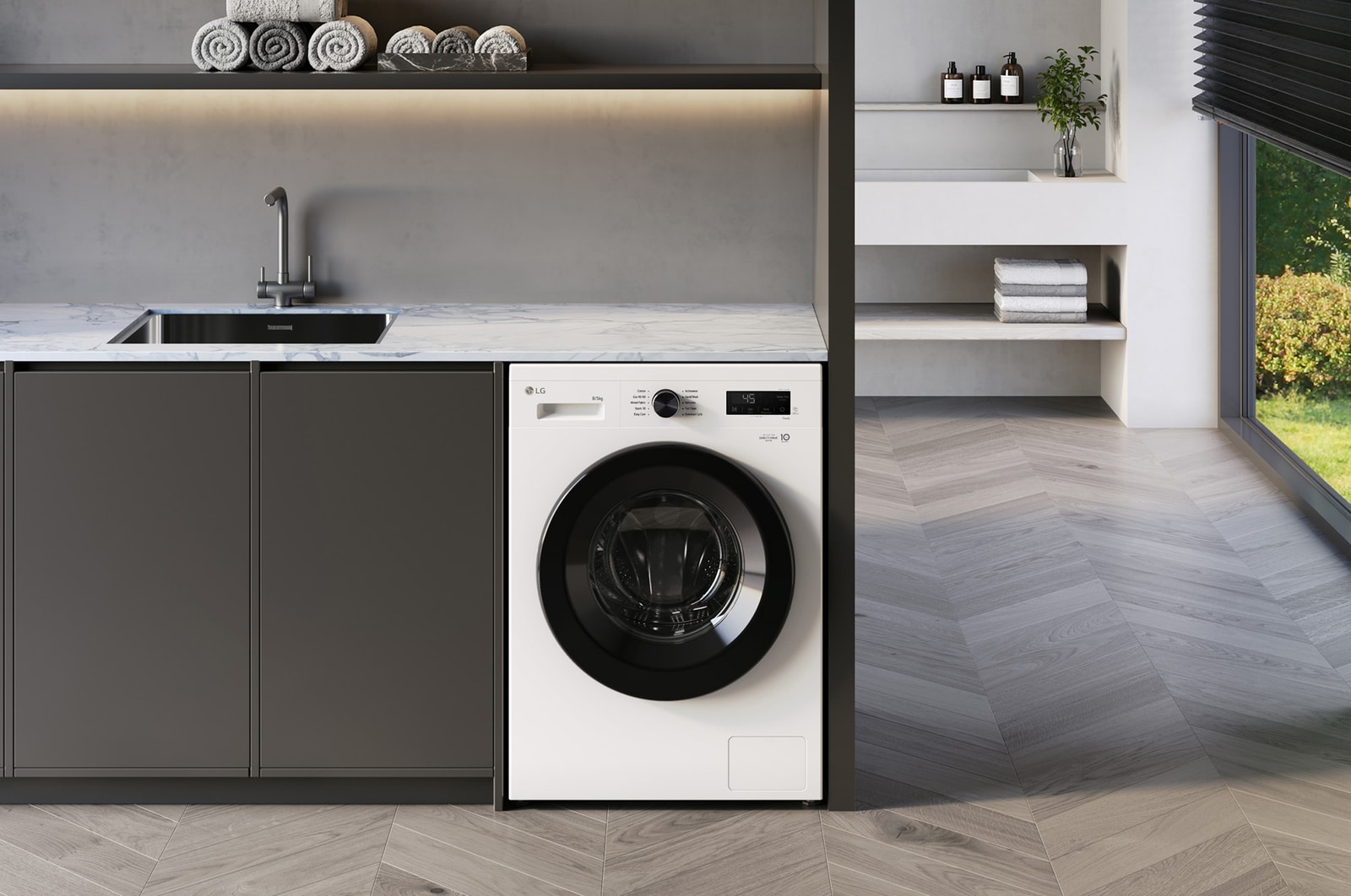 The white LG washer-dryer W4X1085NWK, with 8kg wash and 5kg dry capacity, shown installed under a counter in a modern laundry room.