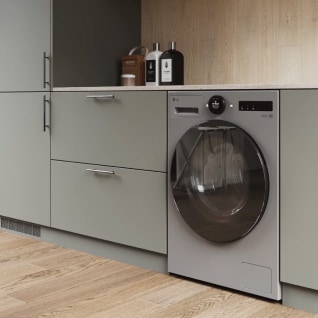 In the laundry room, a silver LG washing machine and dryer are placed side by side, with gray drawers positioned next to them.	