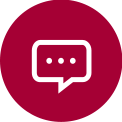 Grey speech bubble icon with three white dots in the centre, on a grey background, indicating a chat function. A white speech bubble with three dots on a maroon background, representing an ongoing conversation.