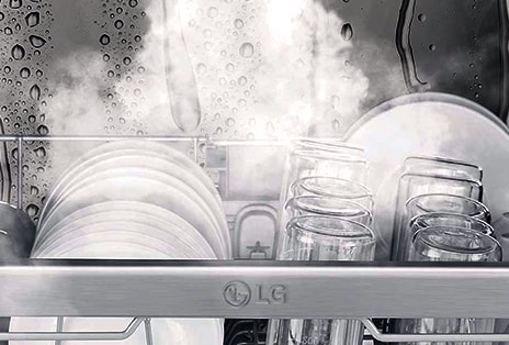 Close up view of dishes and glasses being washed by using true steam feature of LG freestanding dishwasher.	