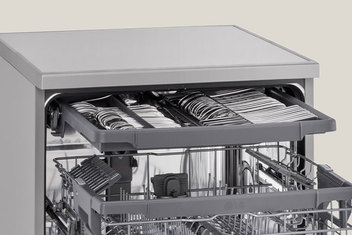 Open LG freestanding dishwasher in the kitchen, showcasing its fully stainless steel interior.	