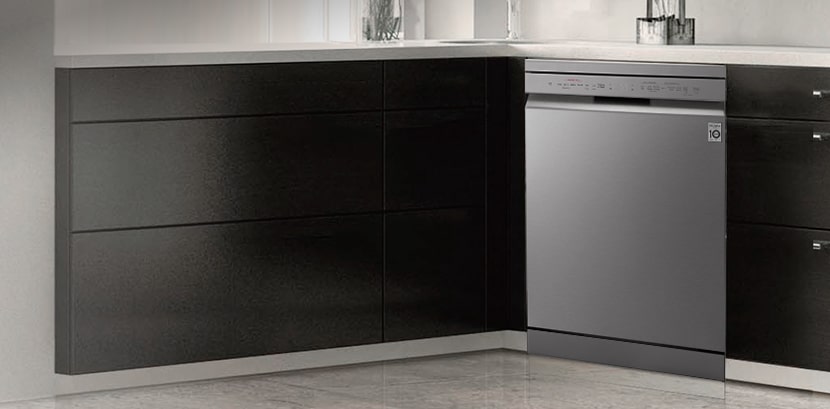 Overall view of a modern kitchen featuring an LG freestanding dishwasher seamlessly installed under the counter.	