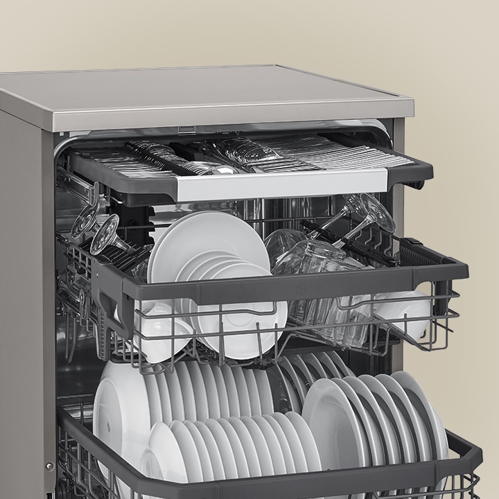 Showcasing how spatulas, spoons, forks, and knives are arranged in the 3rd rack of an LG free-standing dishwasher.	