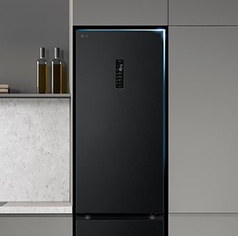 Flat door refrigerator integrated into kitchen cabinets, completing the sealess look.