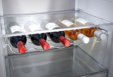  Close-up of wine rack with 5 bottles, enabling efficient use of space.