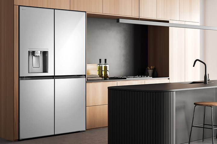 Modern kitchen interior with InstaView fridge.