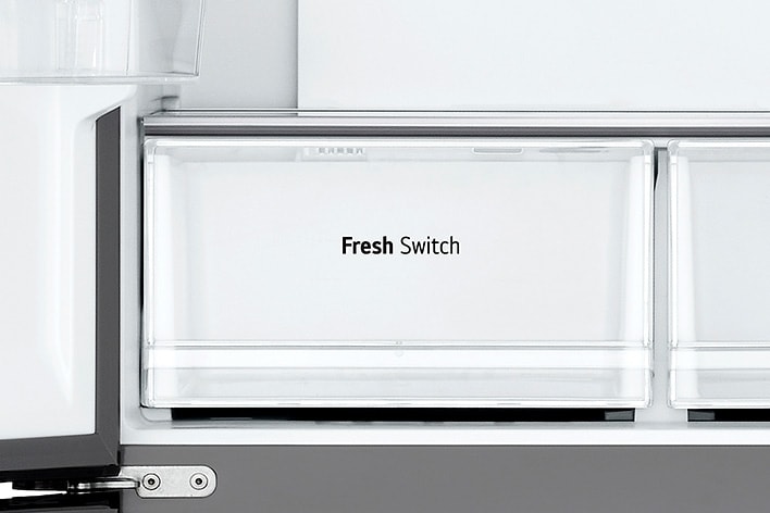 Close up view of lg multi door refrigerator's fresh switch feature that is placed in the refrigerator.