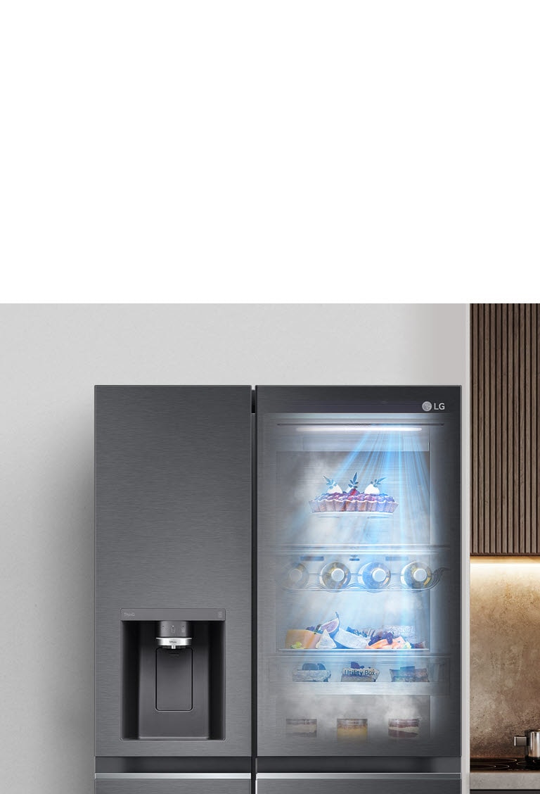 LG side-by-side fridge with visible food items on the right, ice dispenser on the left, sleek design.