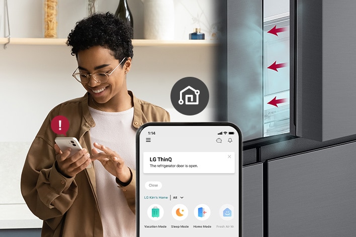 Man receiving open door alert from LG refrigerator via smartphone app.