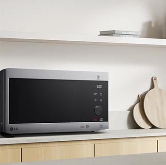 The front view of neochef microwave oven on the kitchen countertop.
