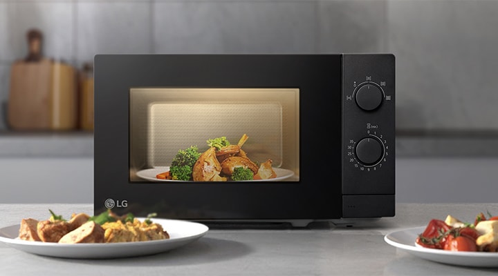 Bright LED lighting inside LG microwave clearly showing food